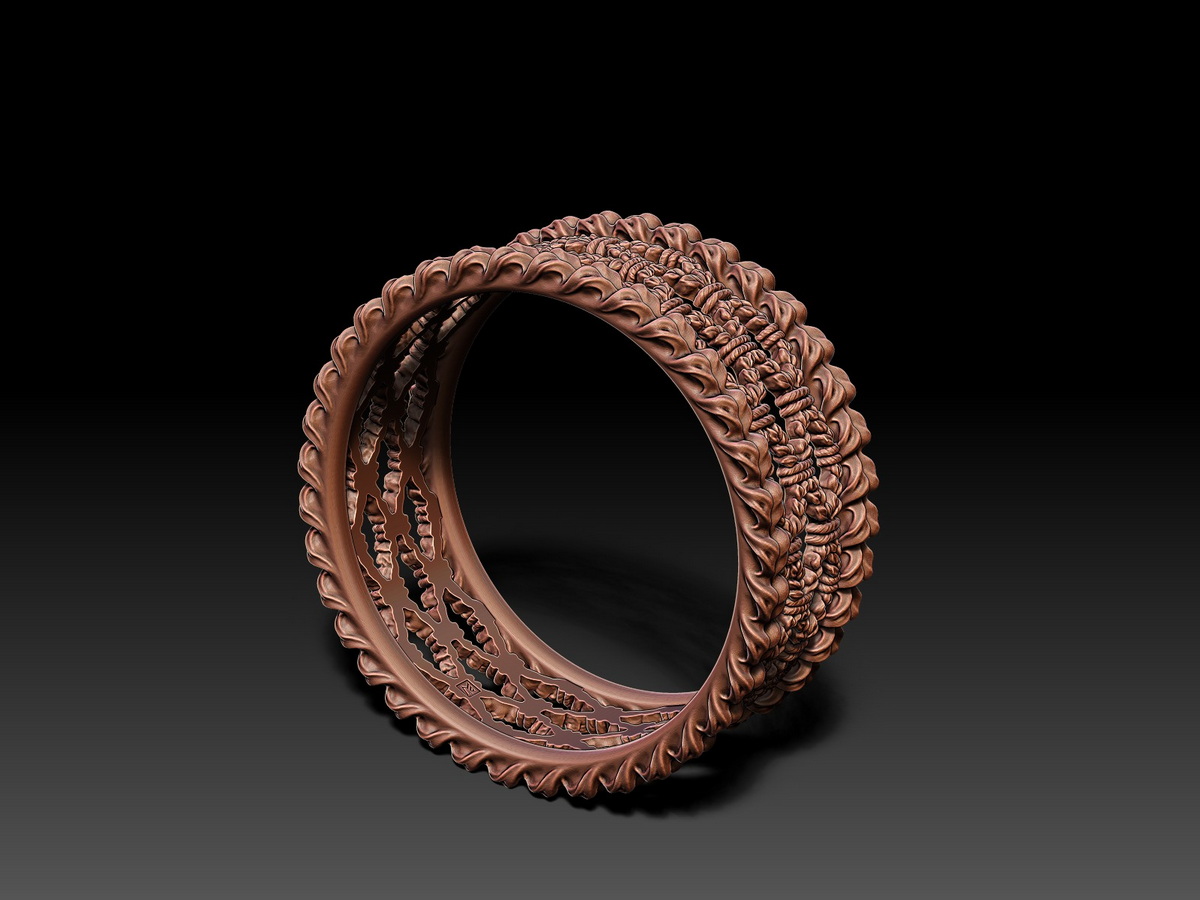 Spikelets Ring shown from an angled view, featuring a detailed sculptural ornament inspired by wheat spikelets and floral forms.